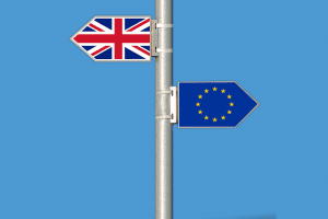 signposts pointing to UK and EU