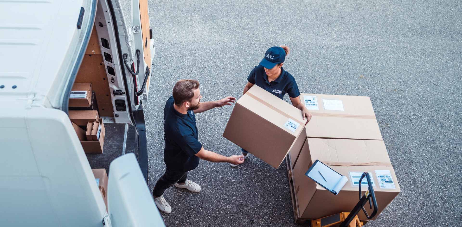 Courier van being loaded with parcels