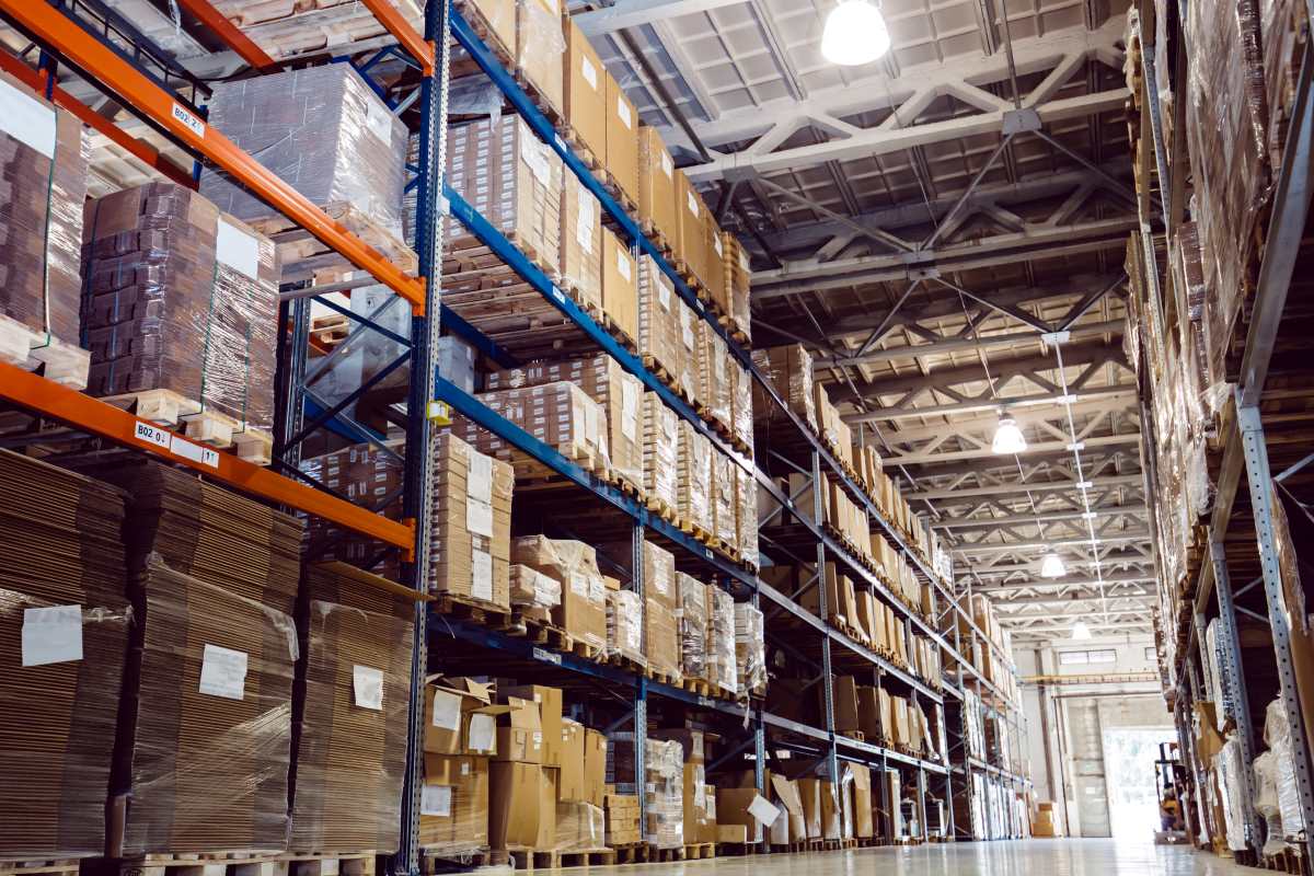 inside warehouse with a range of shipments and parcels 5 tiers high